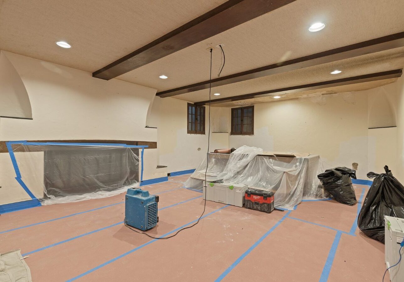 Loft Drywall & Plaster professional repairing damaged plaster walls in Upper St. Clair, PA with clean and precise workmanship